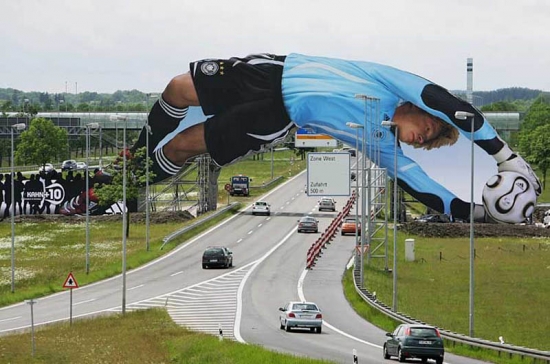 creative billboard over a road