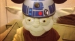Yoda wearing an R2D2 hat