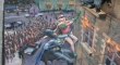 Batman and Robin climbing a building