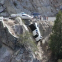 Boat tips car over the edge
