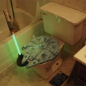 Millenium Falcon toilet seat and lightsaber toilet plunger