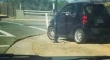 A Smart car crossing the road