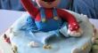 Mario popping out of a cake